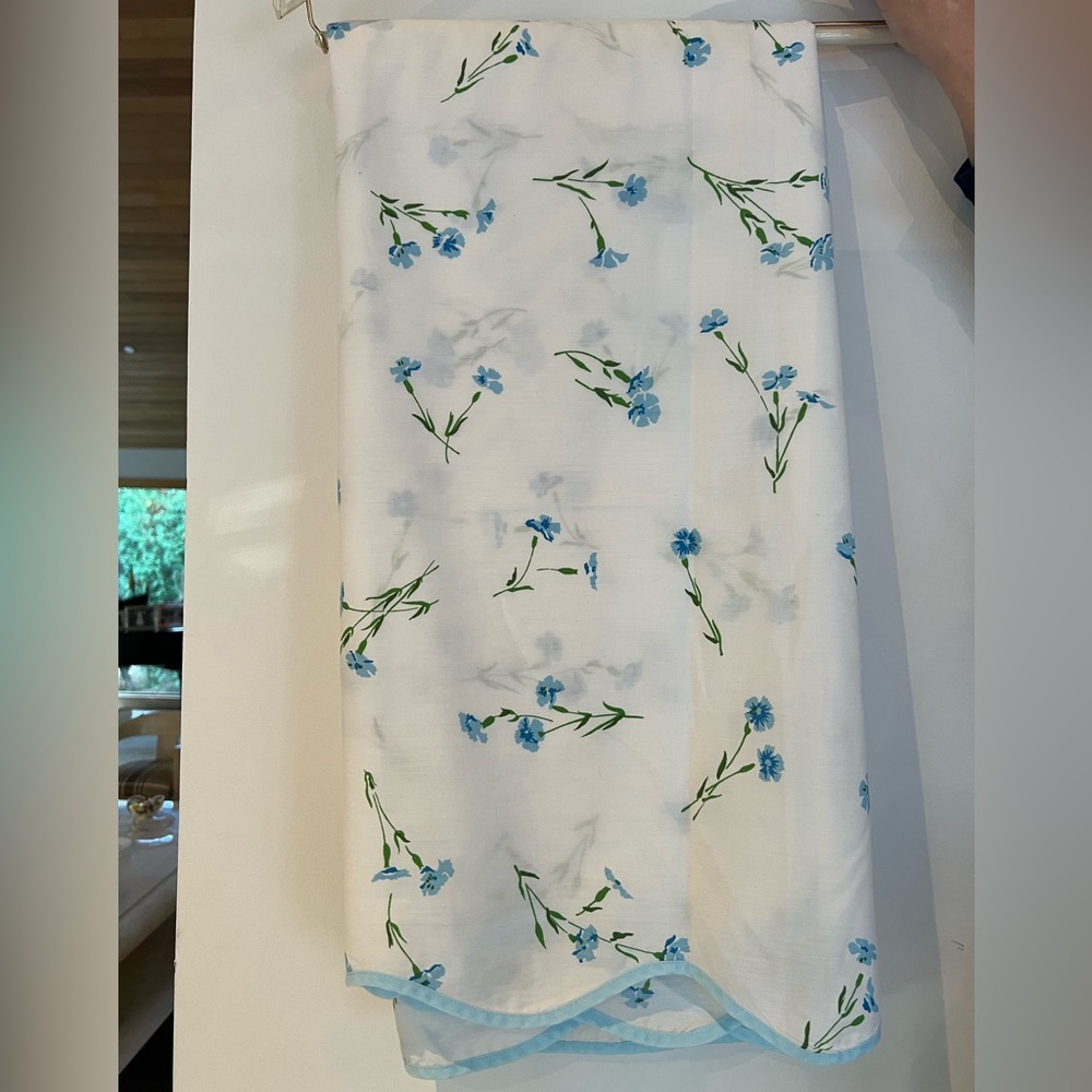 Blue and White Floral Carlin decorative coverlet to go on top of bedding.